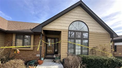 A woman shot with a crossbow and a priest stabbed in a rectory shake a small Nebraska town